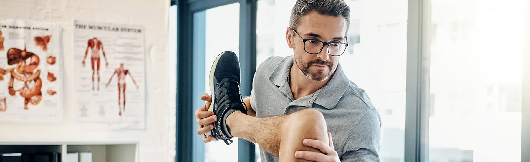 Physiotherapist treating a patient's knee